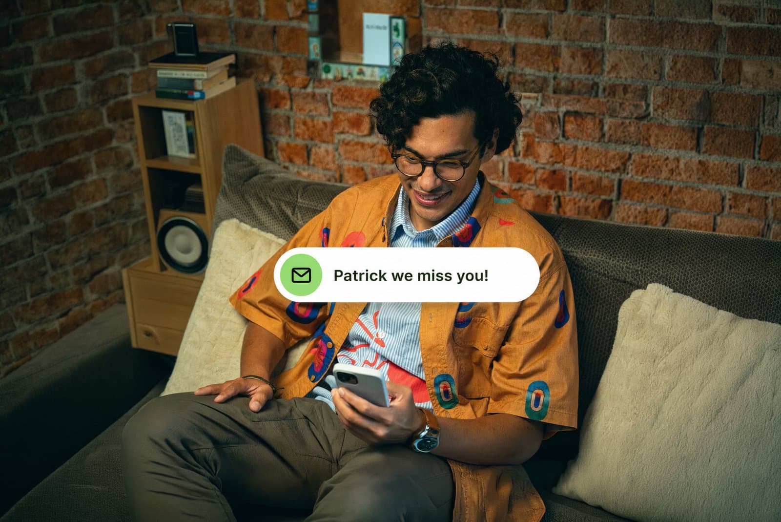 A guest reading a win-back message on his phone at home