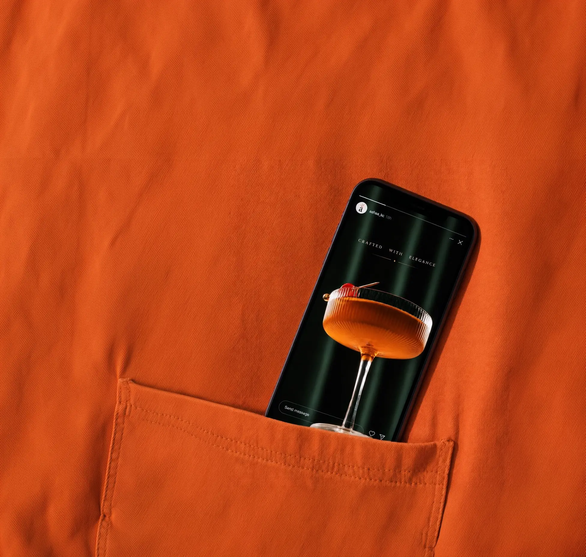 A phone in an orange jacket pocket showing a restaurant story