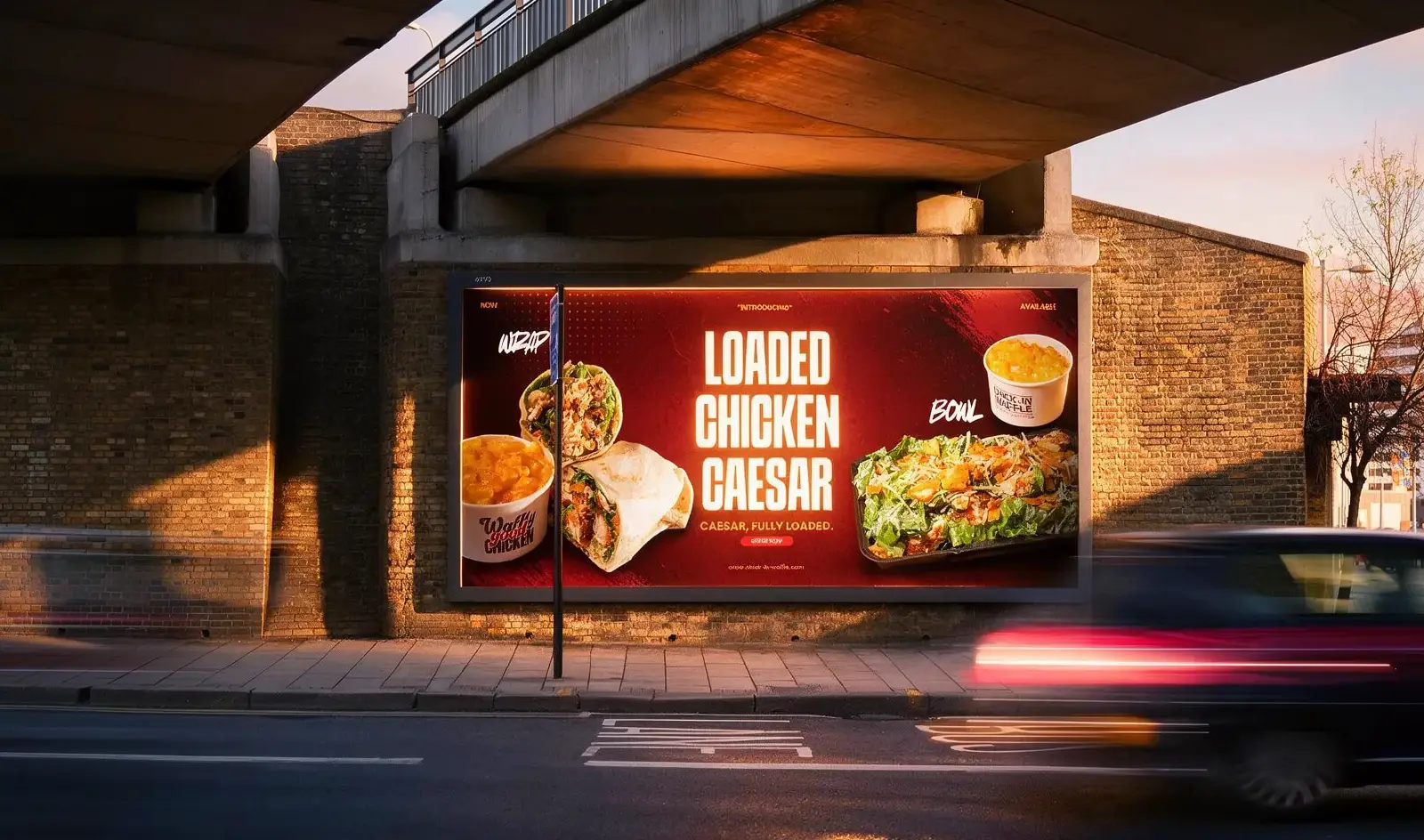 A roadside billboard carrying the brand at dusk